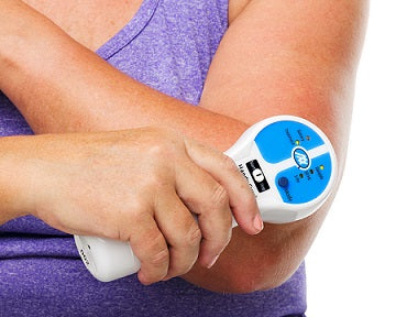 Handy Pulse Laser positioned on elbow joint for tennis elbow treatment